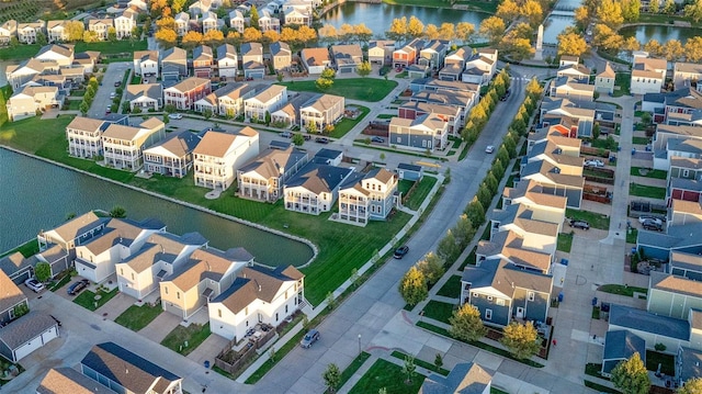 aerial view featuring a water view and a residential view