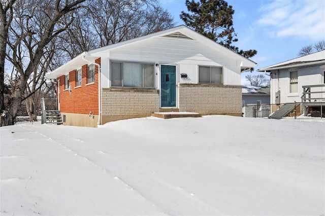 view of front of home with brick siding