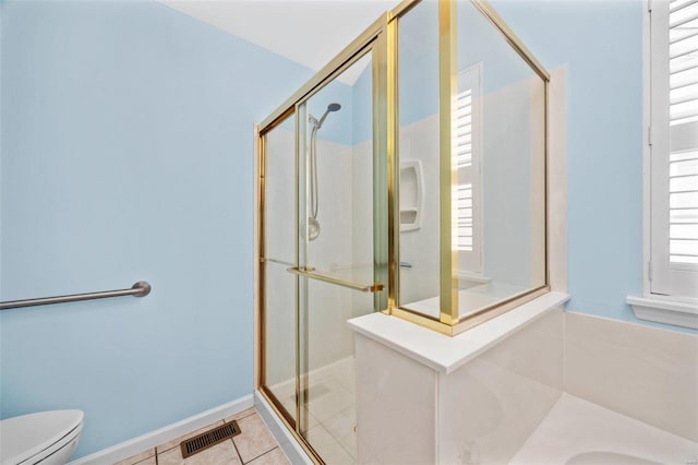 full bathroom with a stall shower, visible vents, and tile patterned floors