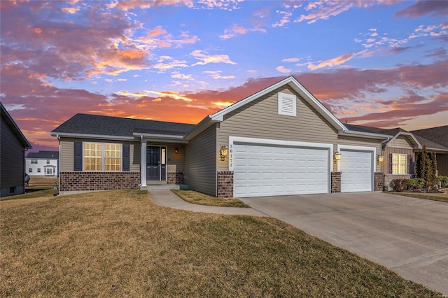 single story home with a garage, concrete driveway, brick siding, and a front yard