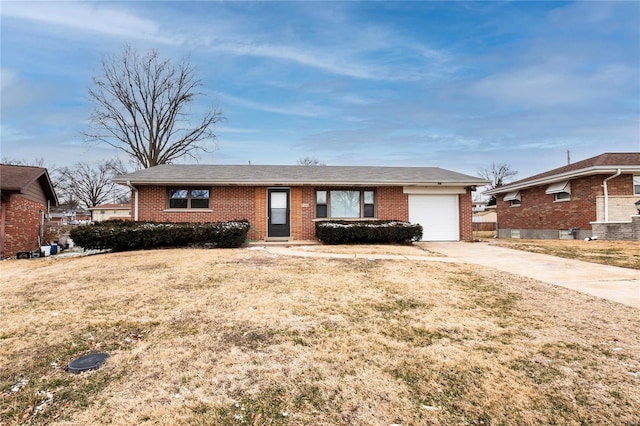 single story home with a front yard and a garage