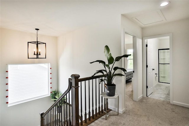 hallway with light carpet