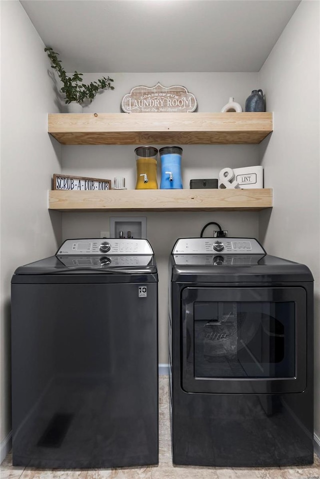 laundry room with laundry area and independent washer and dryer