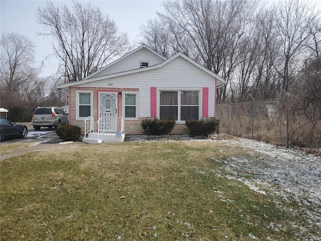 view of front of property with a front lawn