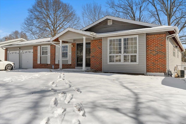 ranch-style home with brick siding and an attached garage