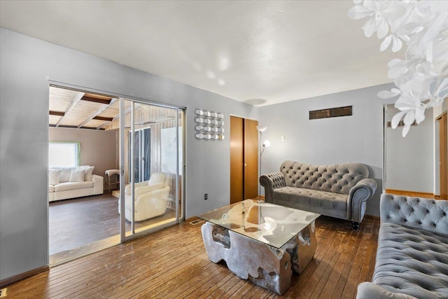 living area featuring hardwood / wood-style floors