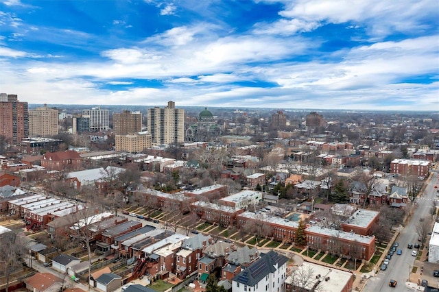 birds eye view of property featuring a view of city