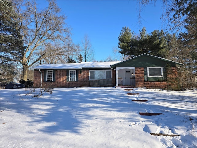 ranch-style house with brick siding