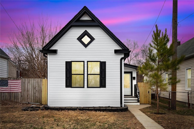 view of front of house with fence