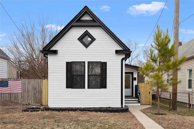 view of front of home with fence