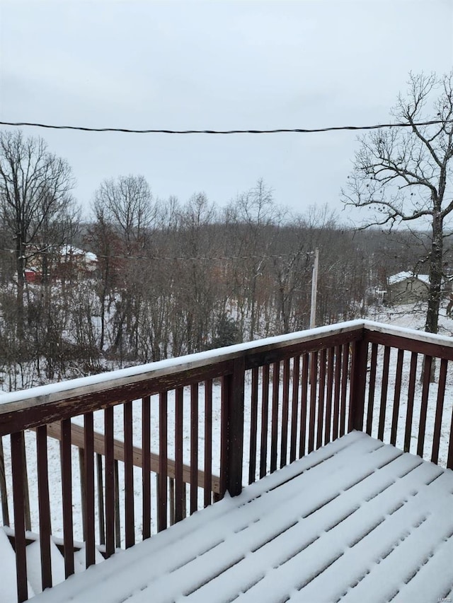 view of snow covered deck