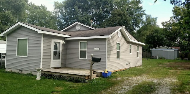 view of home's exterior with a lawn