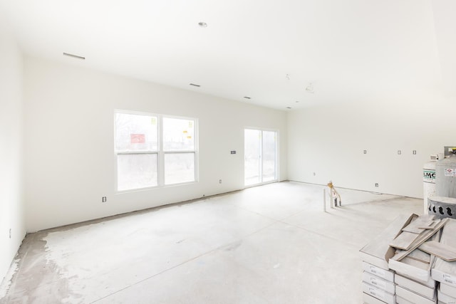 spare room featuring concrete flooring