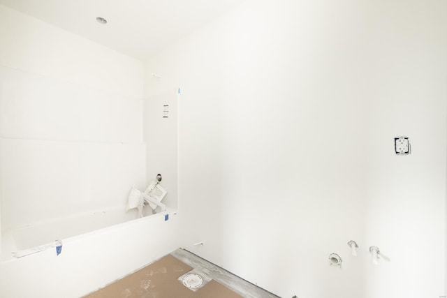 bathroom with concrete flooring