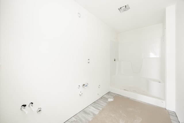 bathroom with wood finished floors