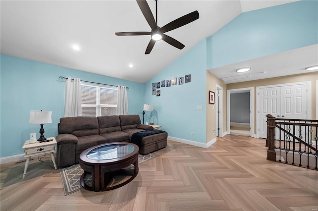 living area with baseboards, high vaulted ceiling, a ceiling fan, and recessed lighting