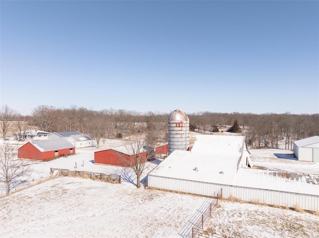 view of yard layered in snow