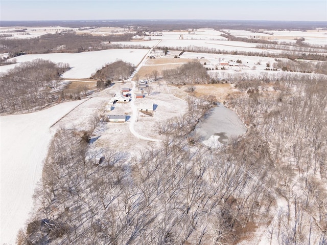 snowy aerial view with a rural view