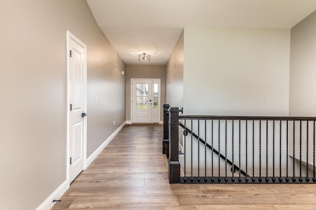 hallway featuring hardwood / wood-style flooring