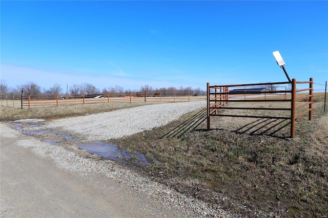 exterior space with a rural view