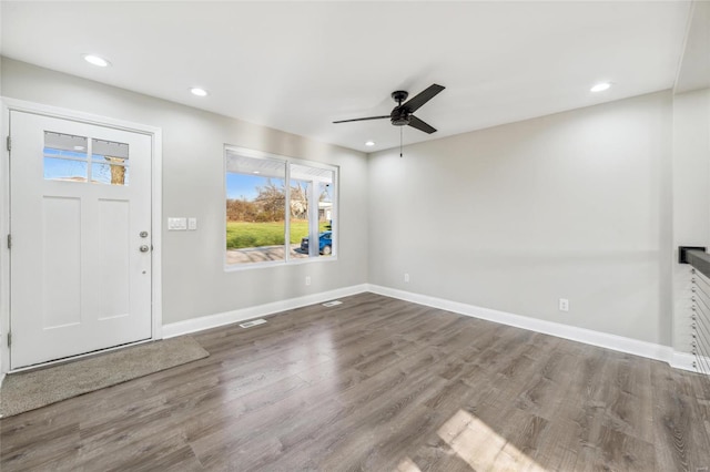 entrance foyer featuring ceiling fan, recessed lighting, wood finished floors, visible vents, and baseboards