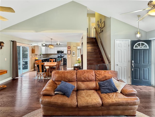 living room with vaulted ceiling, hardwood / wood-style floors, and ceiling fan