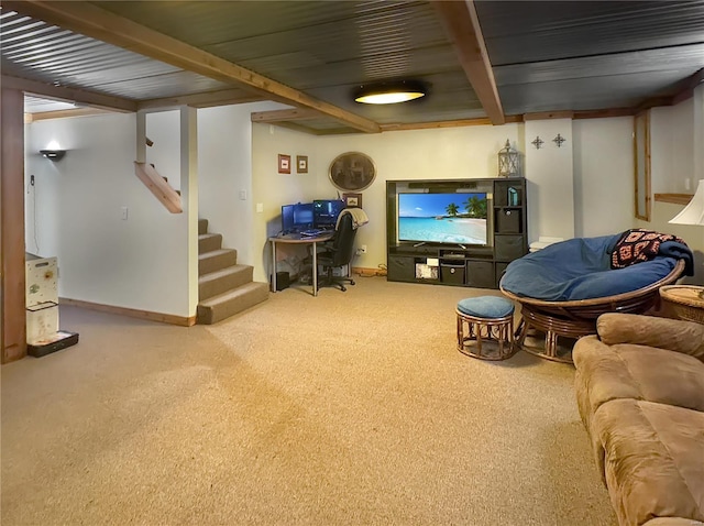 carpeted living room with beam ceiling