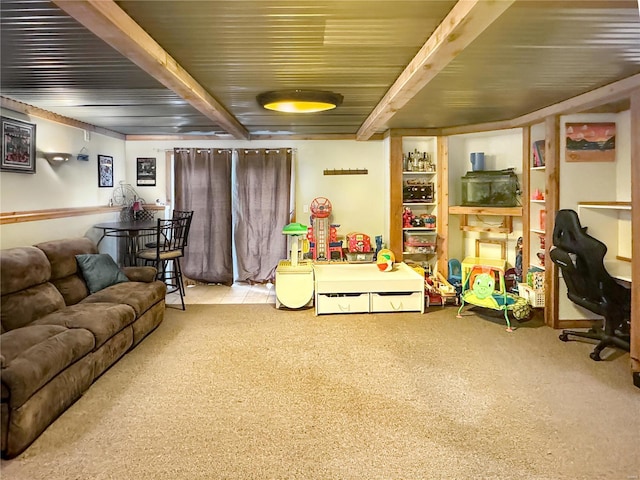 game room featuring beam ceiling and light colored carpet