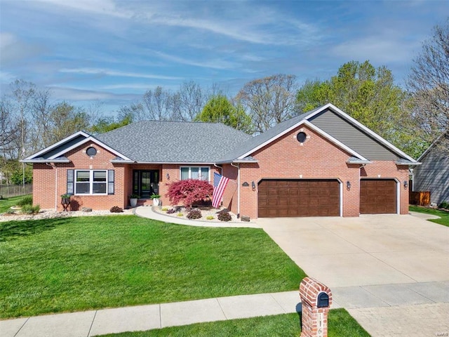 ranch-style home with a front lawn and a garage