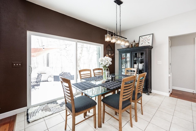 dining room featuring light tile patterned flooring