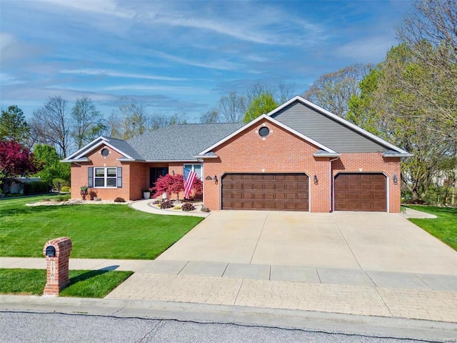 ranch-style home featuring a garage and a front yard