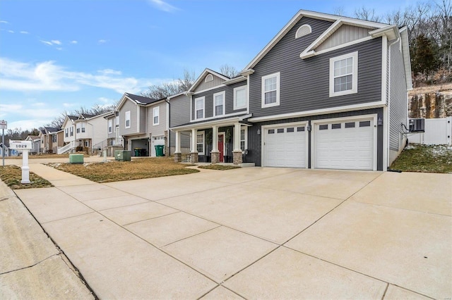 view of front of house with a garage and a porch