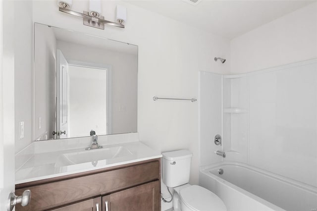 full bathroom featuring shower / bathing tub combination, vanity, and toilet