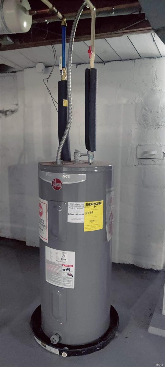 utility room with electric water heater