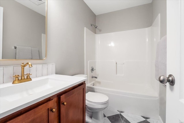 bathroom featuring visible vents, tub / shower combination, vanity, and toilet