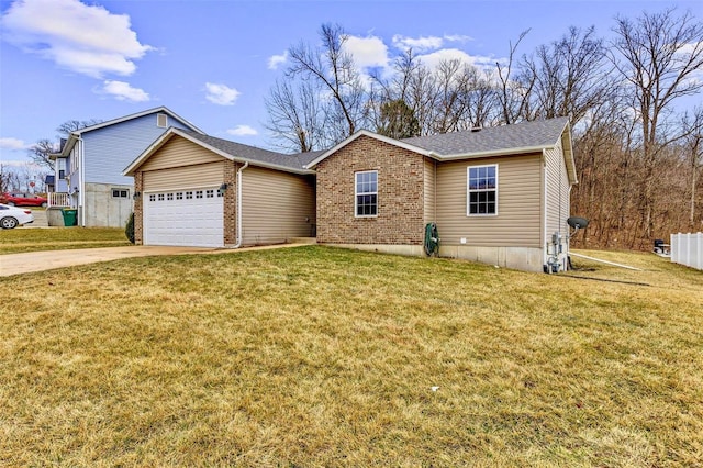 view of front facade featuring a garage, driveway, a front yard, and brick siding