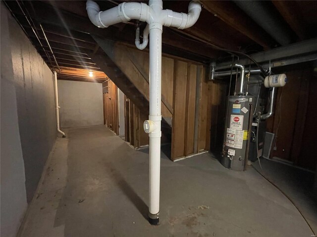 unfinished below grade area with gas water heater