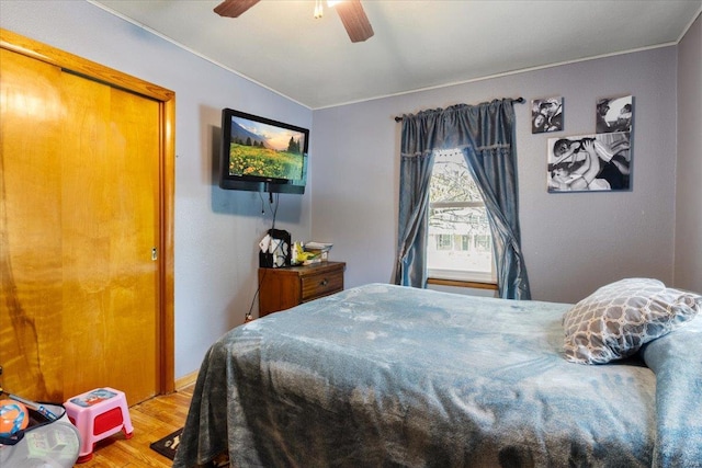 bedroom featuring ceiling fan and light hardwood / wood-style floors