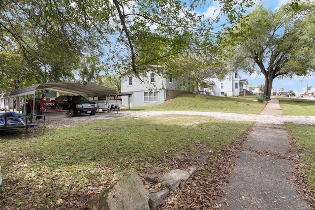 view of yard with a carport