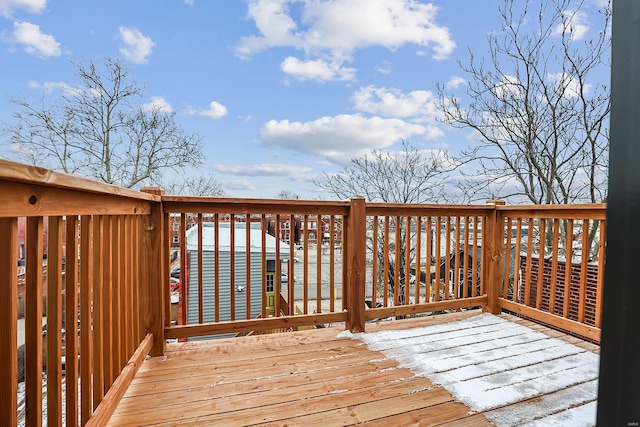 view of snow covered deck