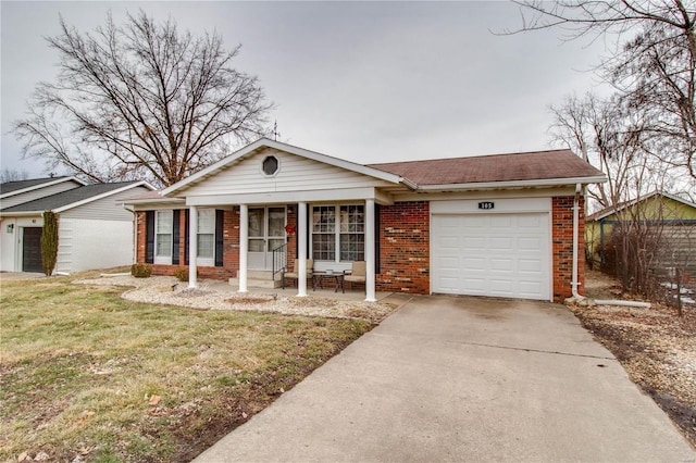 single story home with a garage, covered porch, brick siding, concrete driveway, and a front yard