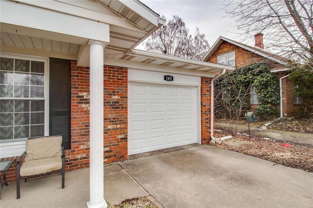 garage with driveway