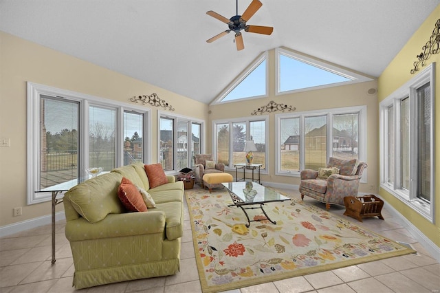 sunroom / solarium featuring vaulted ceiling and a ceiling fan