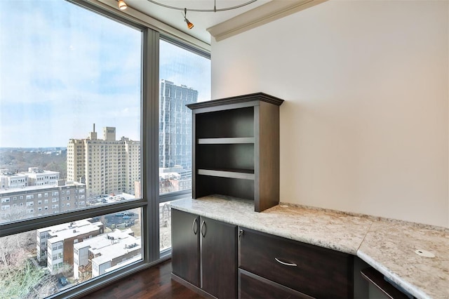 room details with a view of city and built in desk