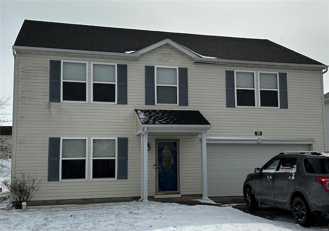 view of front of house with a garage