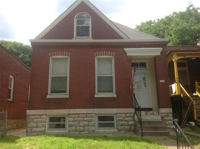 back of property with brick siding