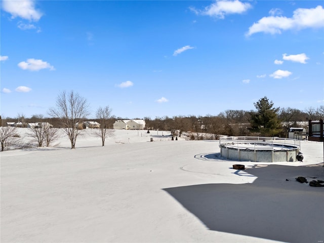 view of yard covered in snow