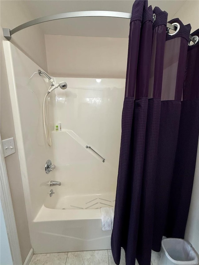 bathroom featuring shower / tub combo and tile patterned floors