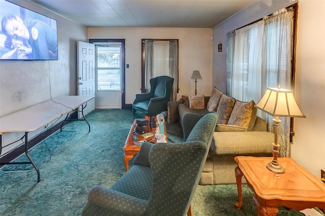 living area featuring carpet flooring