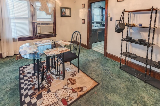 carpeted dining area featuring cooling unit, visible vents, and baseboards